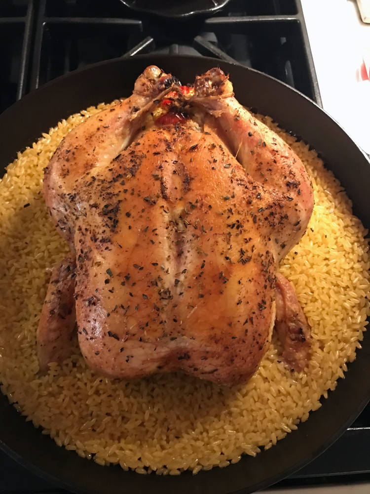 Finished roasted chicken with orzo baked in the same pan